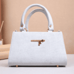 Women’s White Textured Trapezoid Satchel – Structured Top-Handle Handbag with Gold Bow Hardware and Detachable Crossbody Strap
